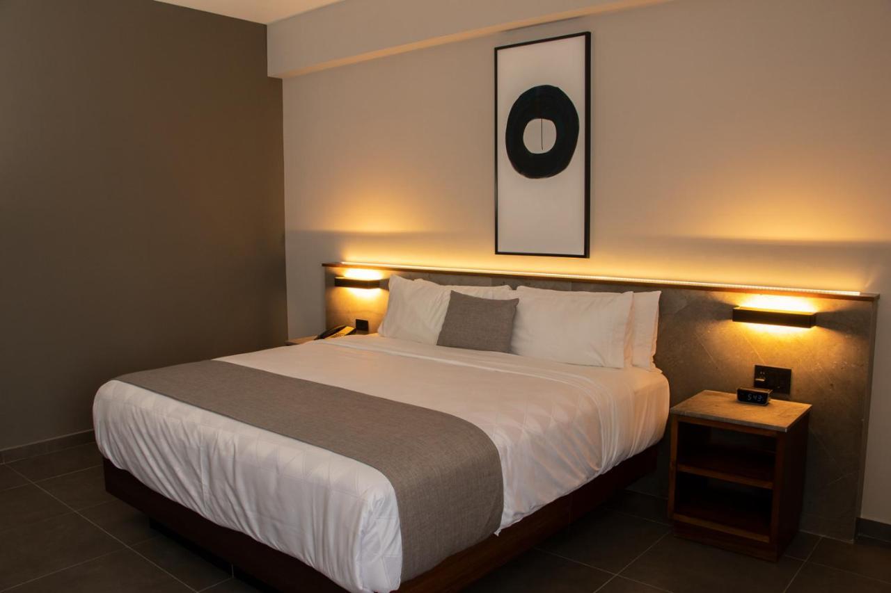 Habitación Deluxe con cama extragrande y vistas a la ciudad